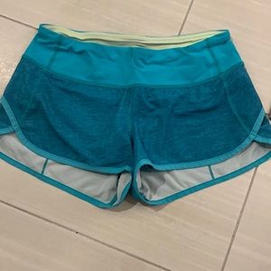 Womens lLlulemon Speed Shorts, size 4, teal w/green trim